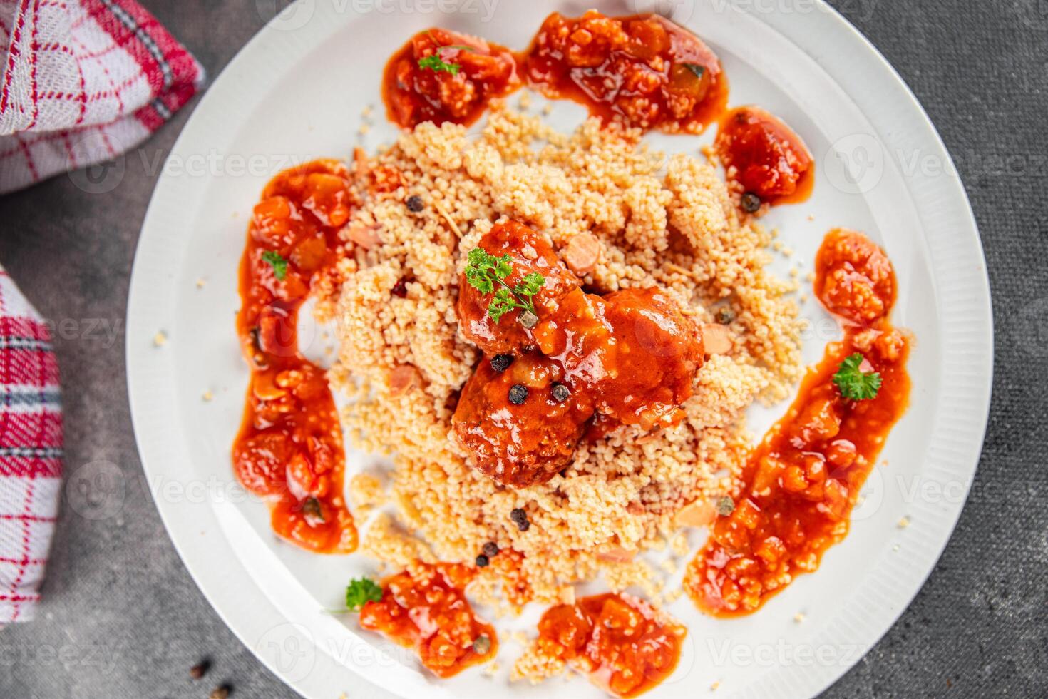 couscous food meat balls vegetable sauce tasty fresh meal snack on the table copy space food background rustic top view photo