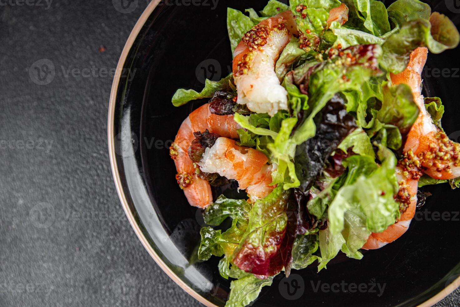 shrimp salad prawns or langoustines green leaf lettuce mix fresh meal food snack on the table copy space food background rustic top view photo