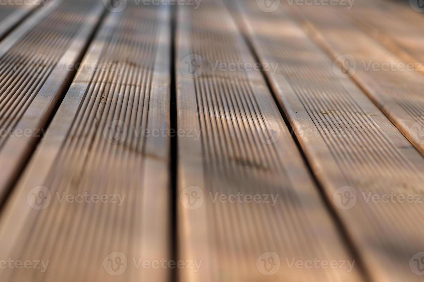 Wooden planks deck close-up perspective, natural background photo