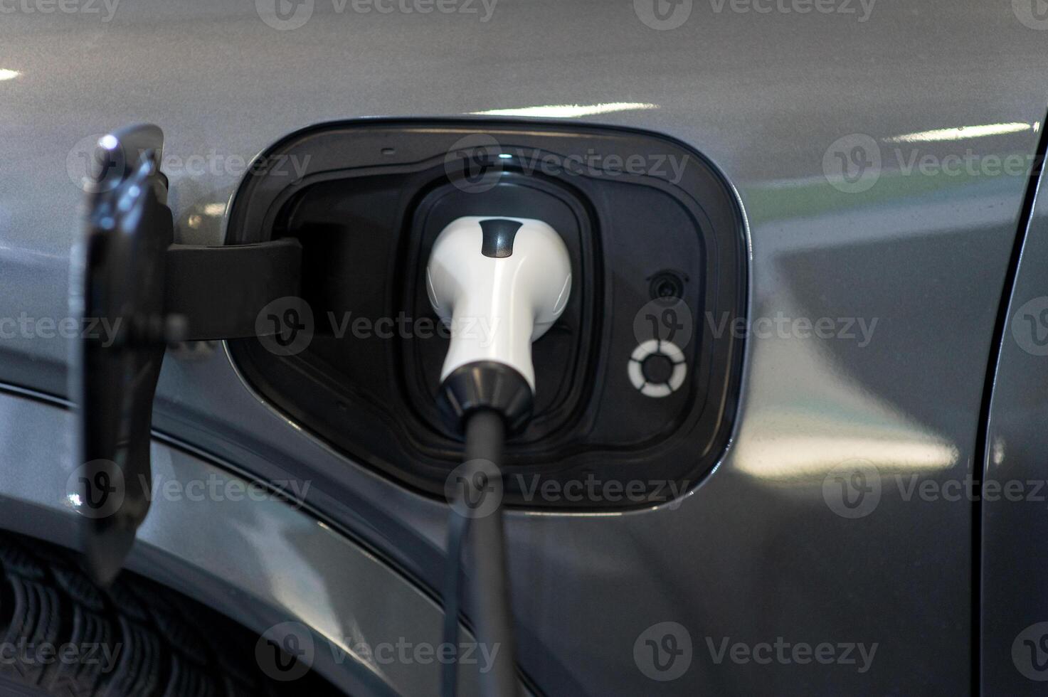 EV charging station for electric car in concept of green energy and eco power produced from sustainable source to supply to charger station in order to reduce CO2 emission photo