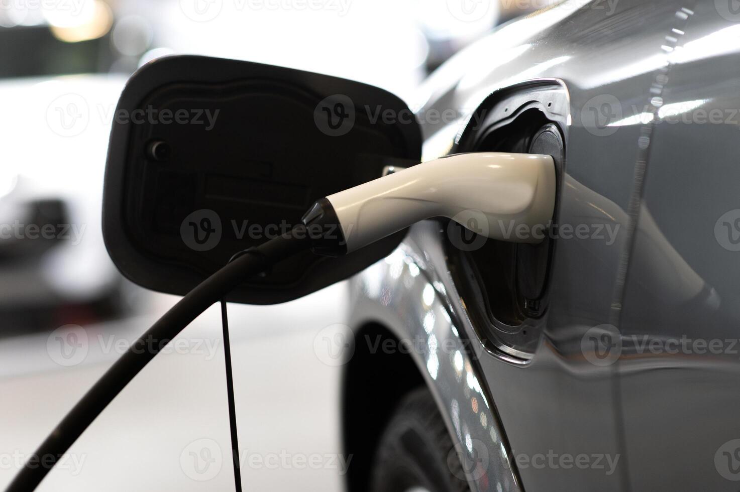 EV charging station for electric car in concept of green energy and eco power produced from sustainable source to supply to charger station in order to reduce CO2 emission photo