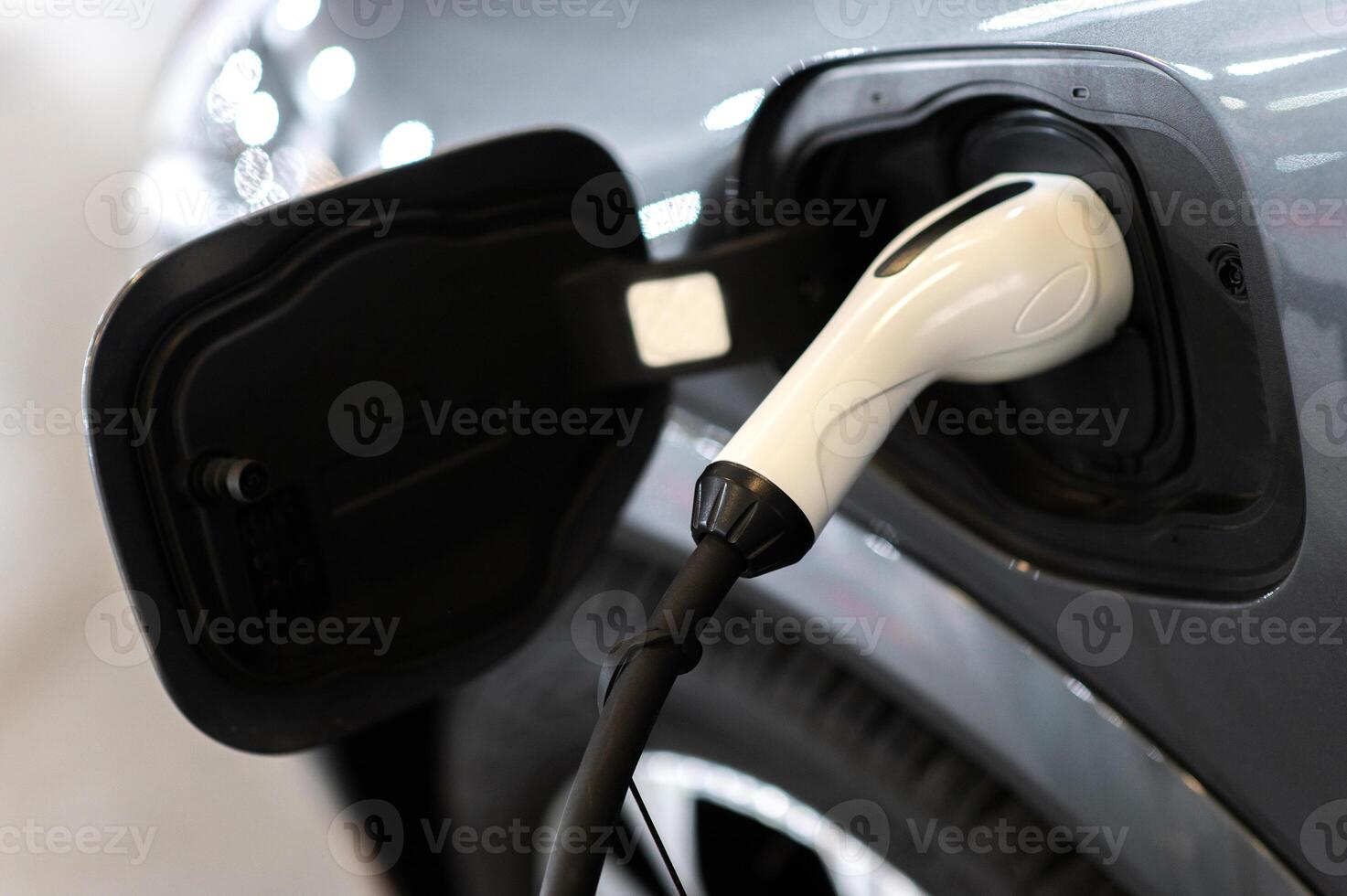 EV charging station for electric car in concept of green energy and eco power produced from sustainable source to supply to charger station in order to reduce CO2 emission photo
