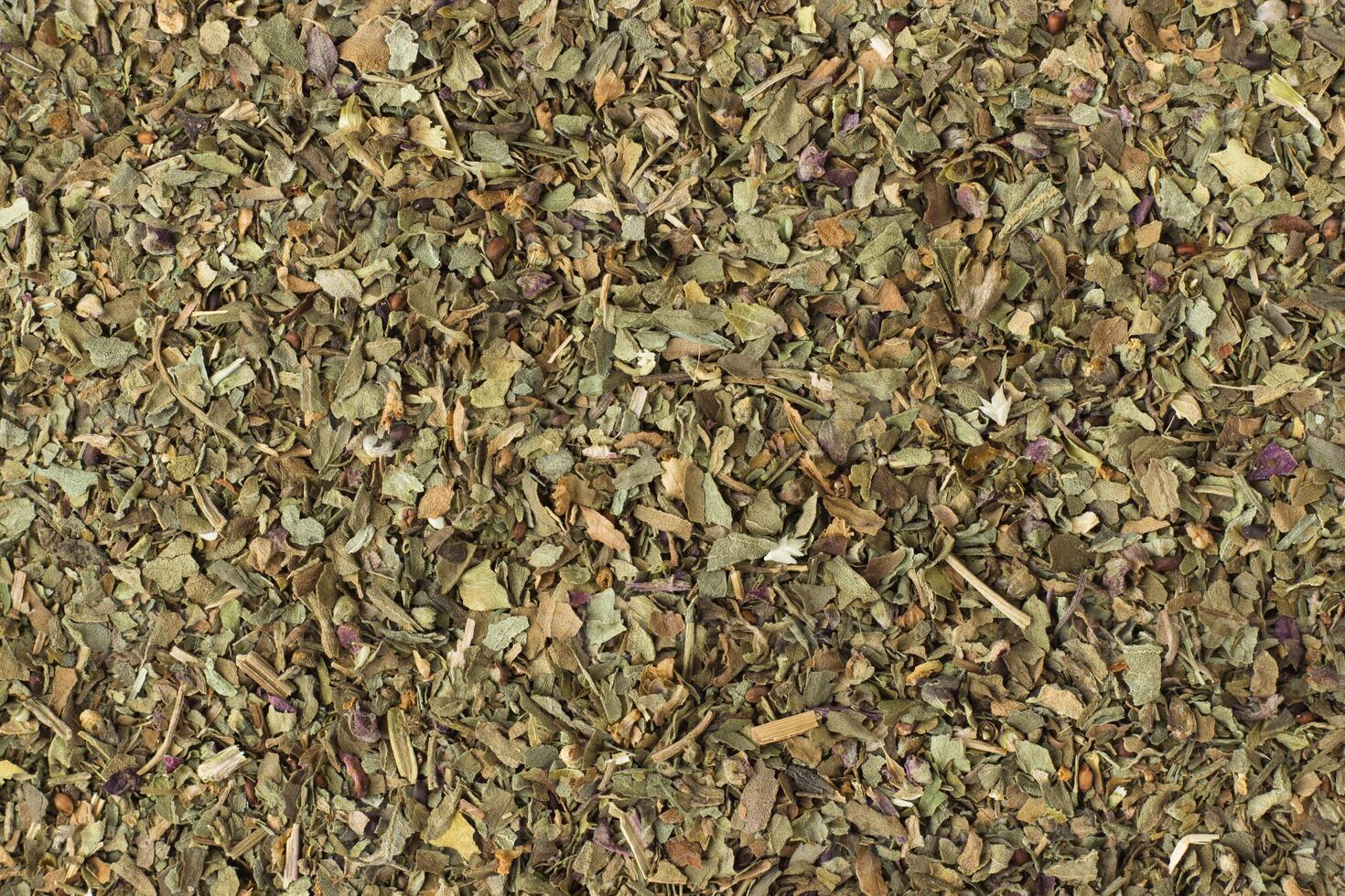 dried marjoram spice as a background, natural seasoning texture photo