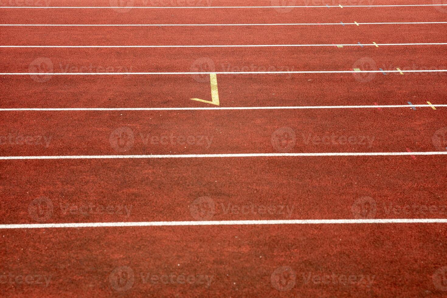 synthetic track with marks in the athletics stadium photo