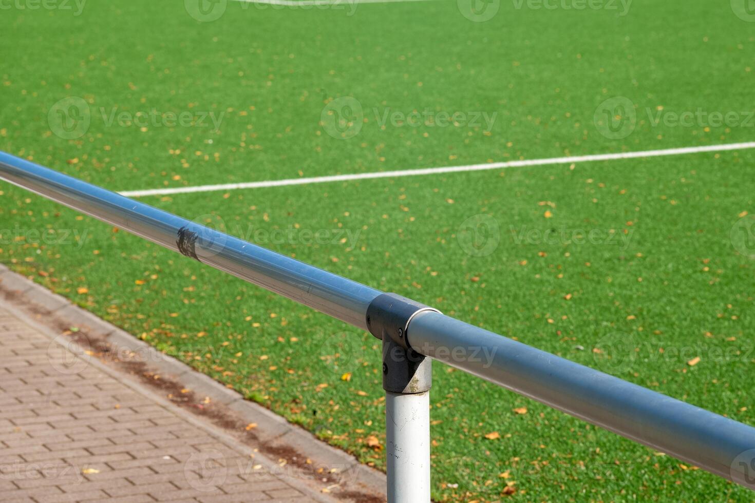 barrier at an artificial turf pitch photo