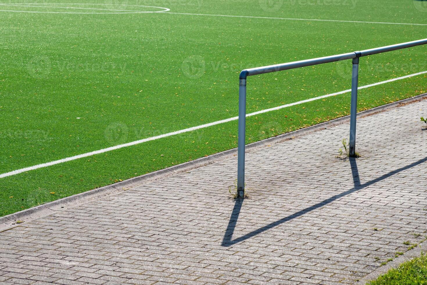 barrier at an artificial turf pitch photo