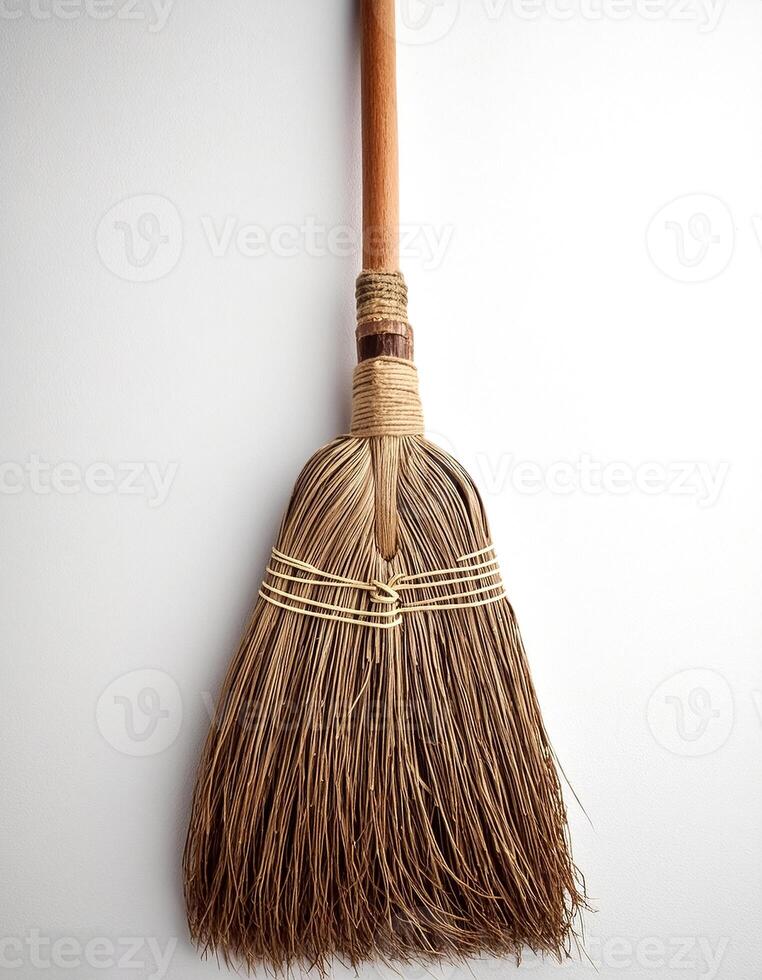 Top of view one broom stick on the white background photo