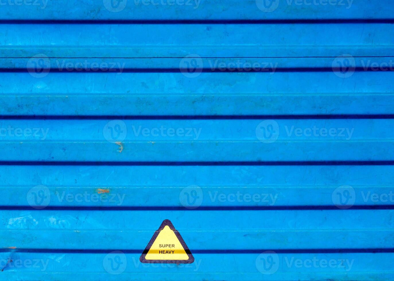 Super heavy truck Warning label stick at beside the truck container photo