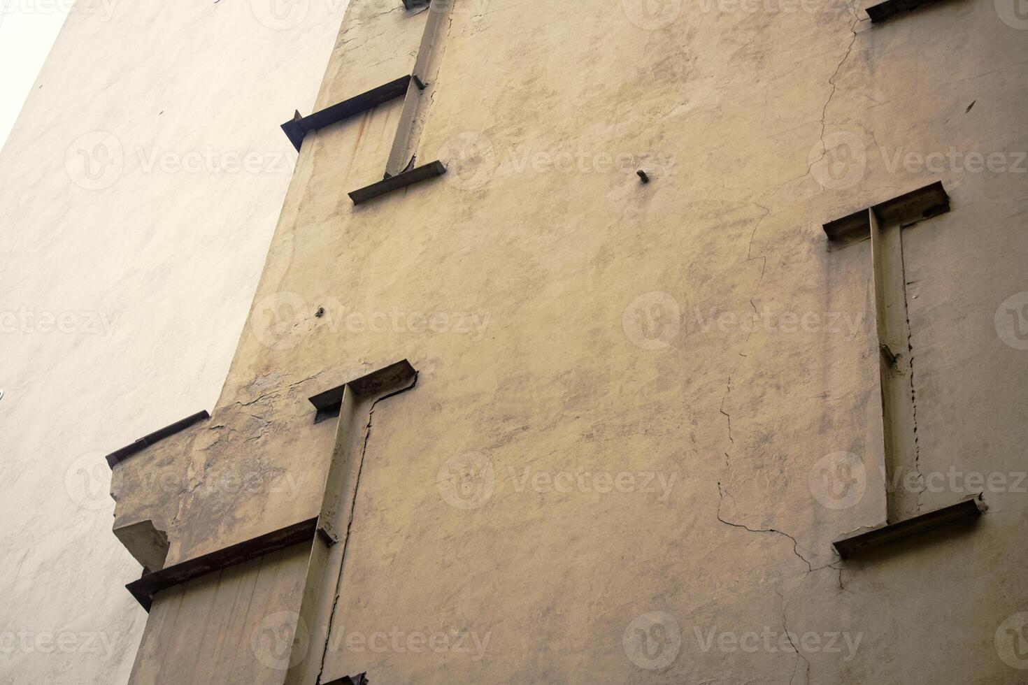 Abstract construction wall at an interesting angle from bottom up photo