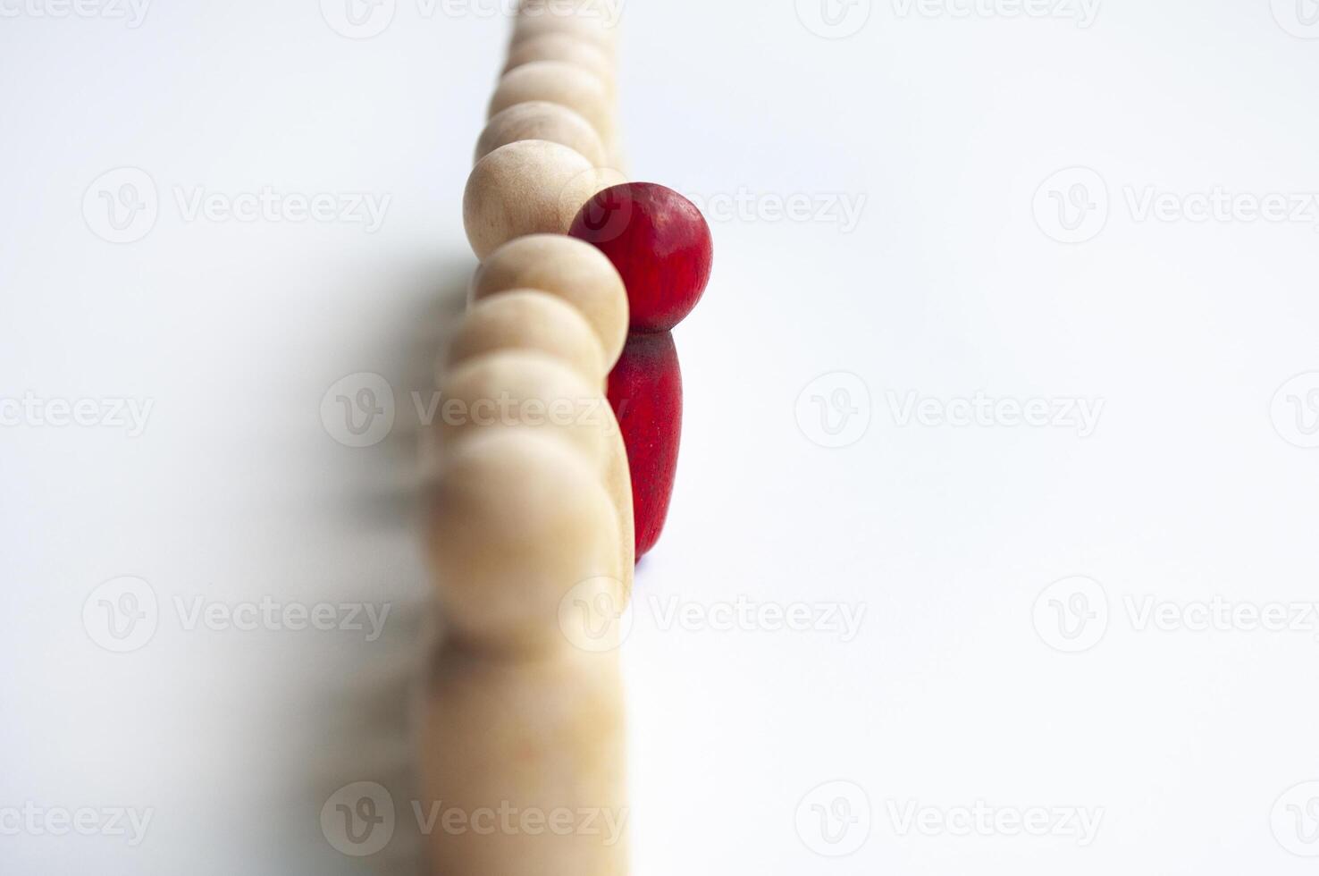 Speak up concept - A red wooden figure appearing as if she or he is dissatisfied. Speak up concept. photo