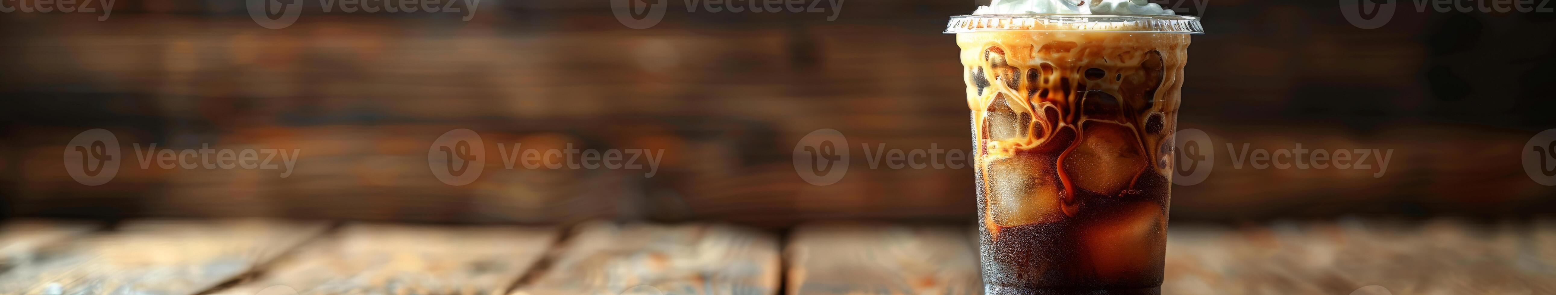 Refreshing Iced Coffee on Wooden Table photo