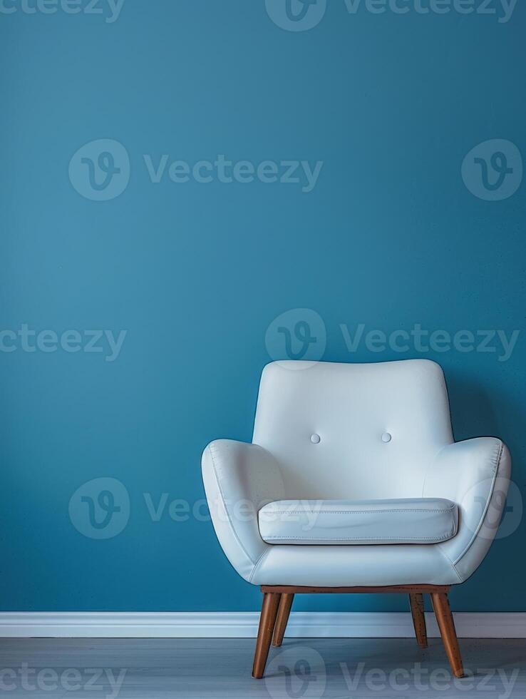 White Chair Against Blue Wall photo