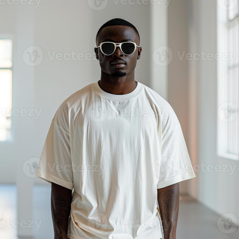 Man in white shirt and sunglasses photo