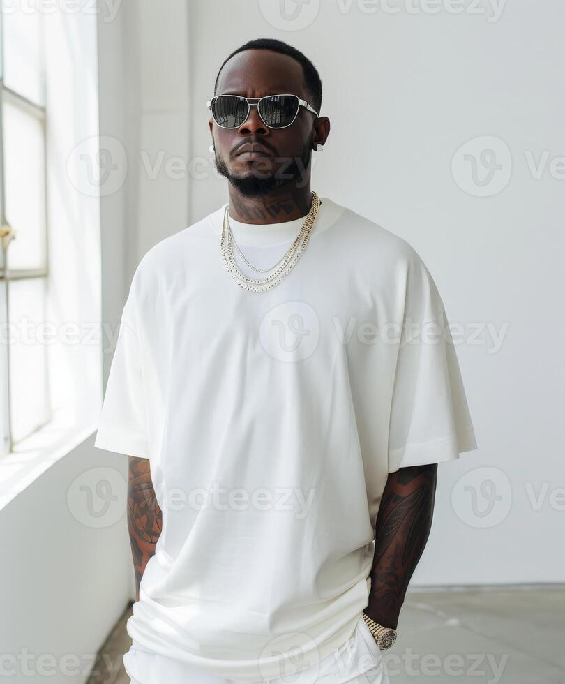Man in white shirt and white pants photo