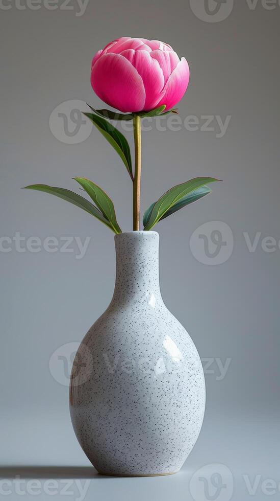 White vase with pink flower photo