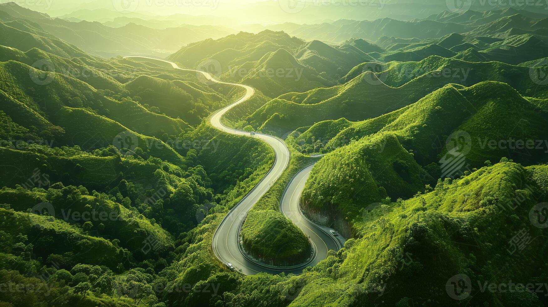 Aerial view of winding road in the mountains photo