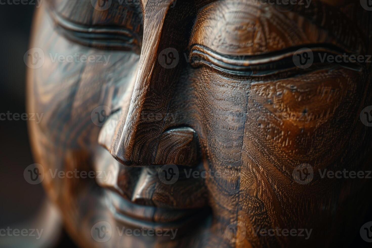 Close Up of Wooden Statue of Persons Face photo