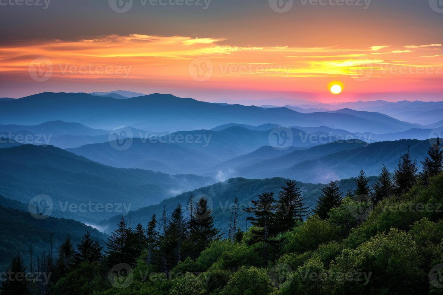 Sun Setting Over Mountain Range photo