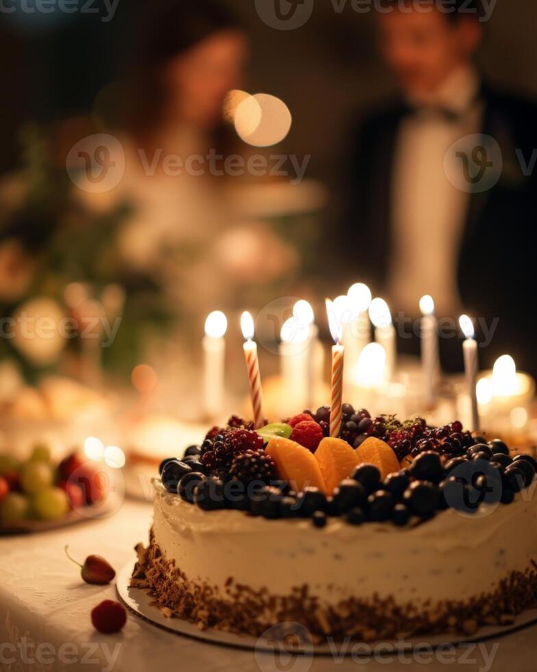 Cake With Candles and Fruit on Table photo