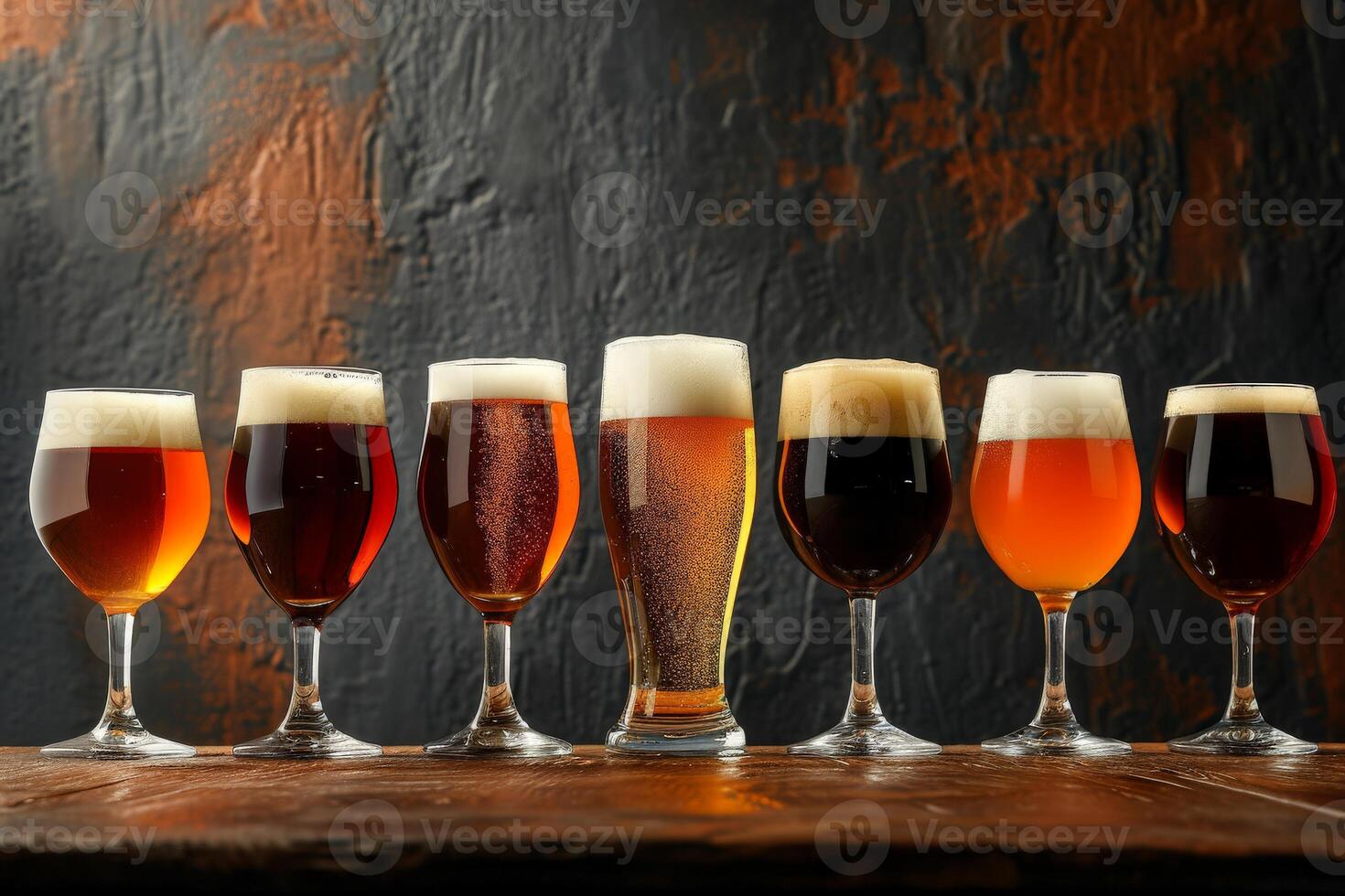 Assorted Beers Displayed in a Row of Glasses photo