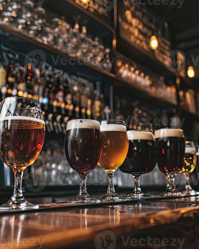 Assorted Beer Glasses Arranged on Bar Top photo