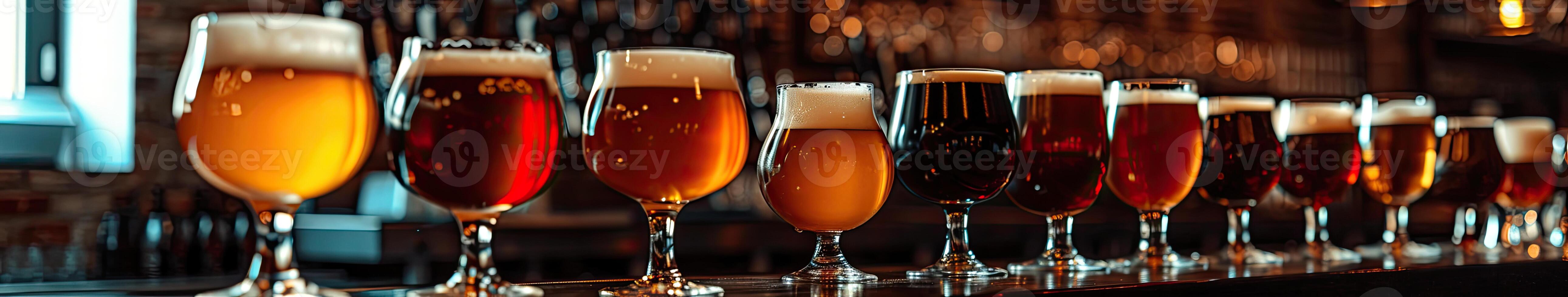 Assorted Beers in a Line-Up of Glasses photo