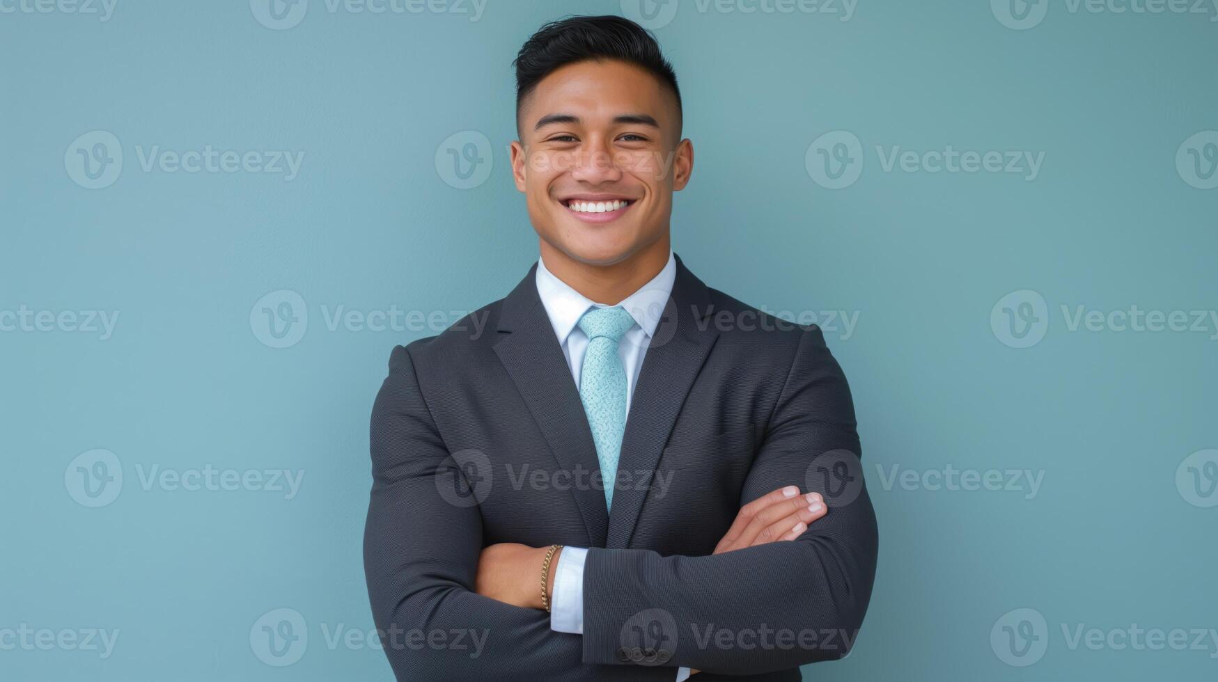 Confident Young Pacific Islander Businessman in Formal Suit Smiling for Professional Portrait photo