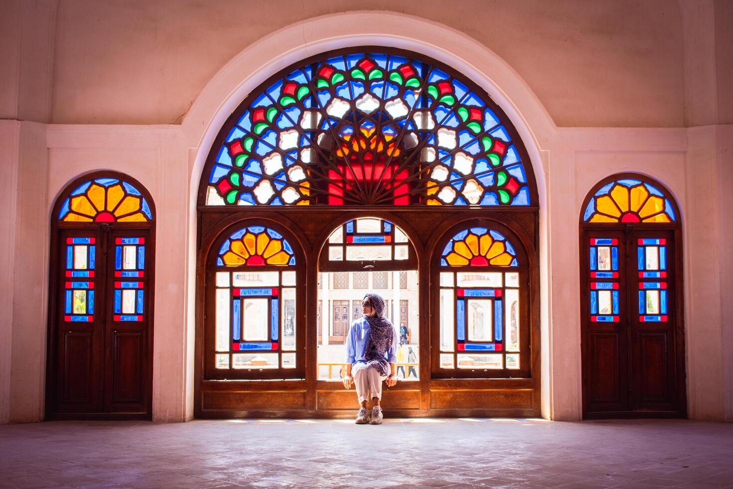 Kashan, Iran - 27th may, 2022 - tourist sit in Tabatabaei House built in early 1880s for the affluent Tabatabaei family. photo