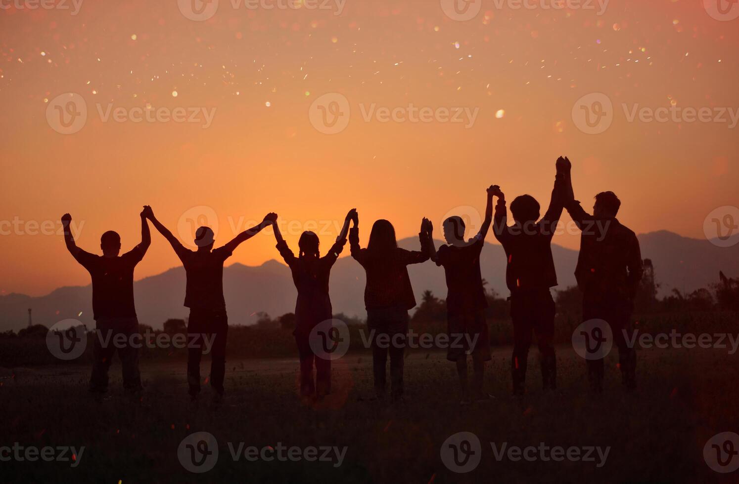 Silhouette of happiness and being free and relaxed in living life, success and working towards planned life goals. photo