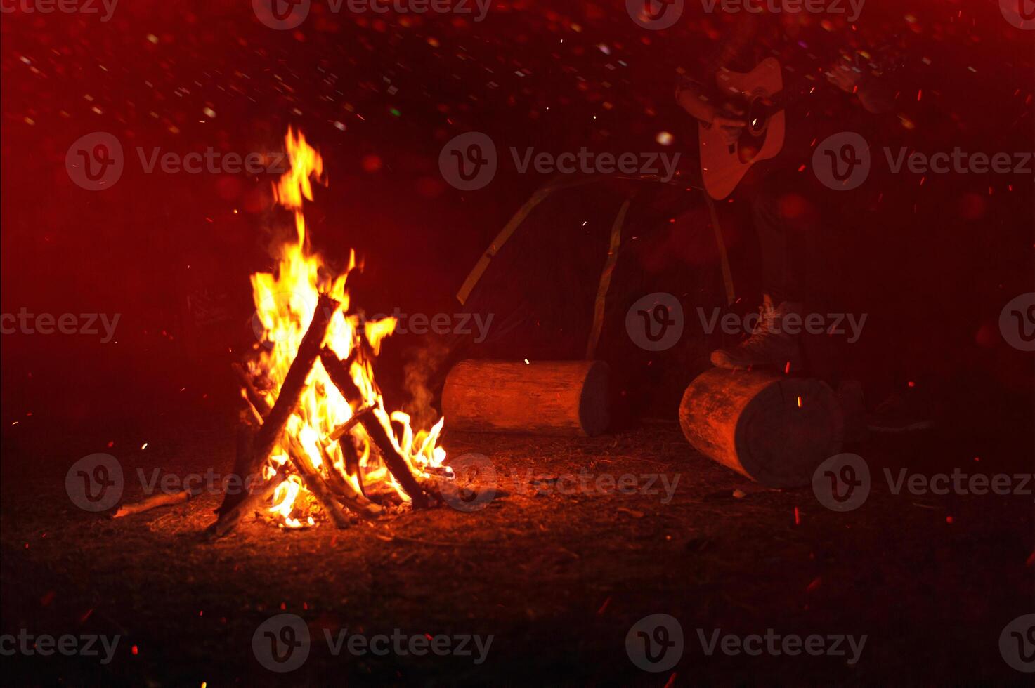 Bonfire at night, lighting a fire to provide additional illumination during dark times. To relieve the cold and add warmth to the body in winter. photo