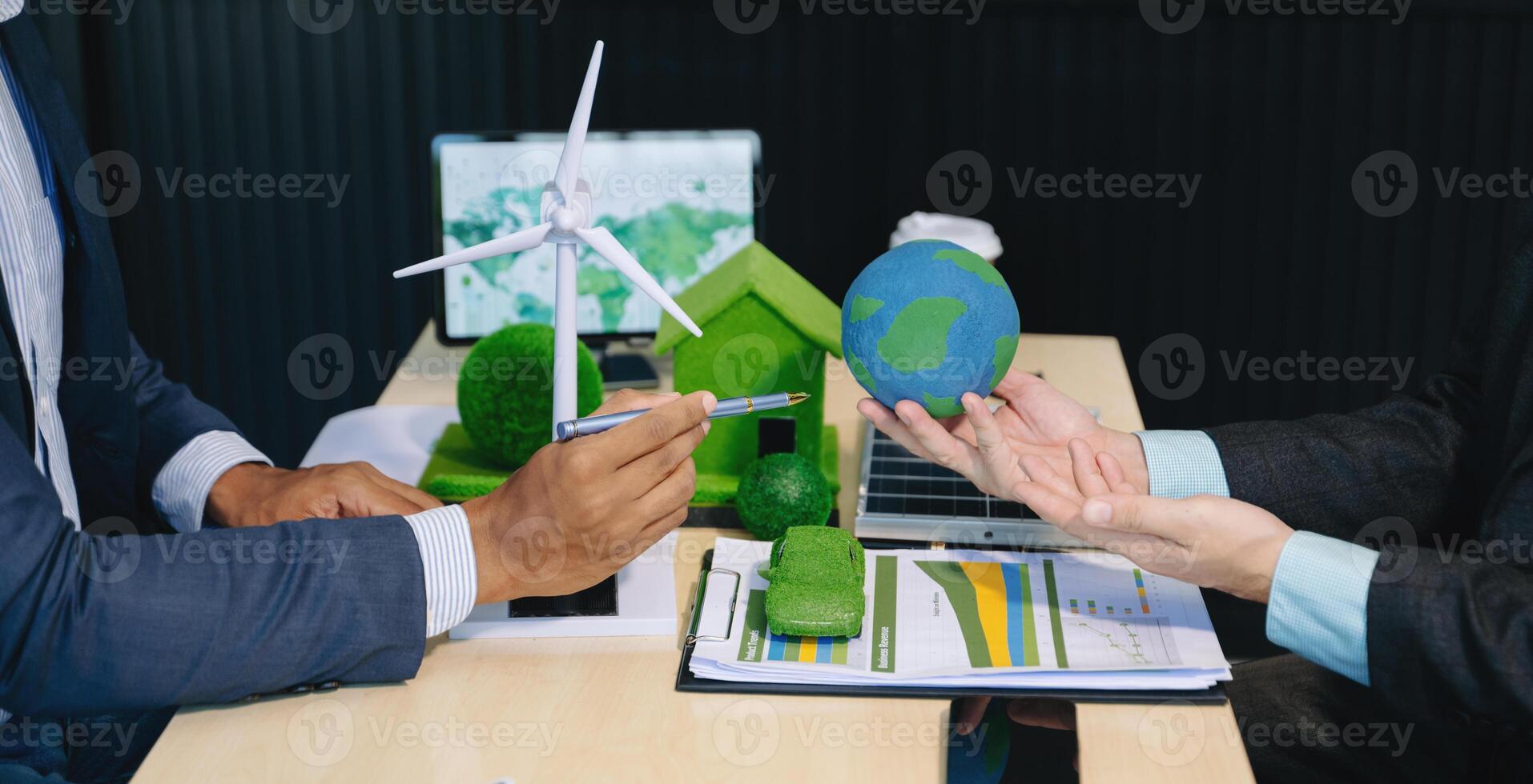 Business team people planning hand using laptop for working technology and business Net zero and carbon neutral concept.NET ZERO photo
