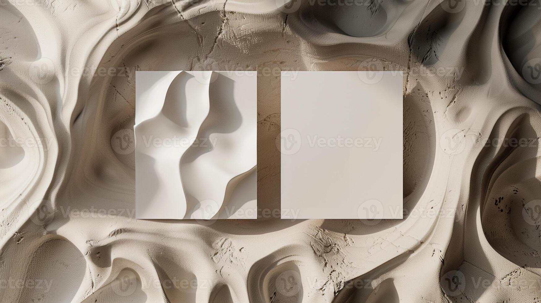 Two pieces of paper mockup rest on textured sculpted sand-like surface. Smooth and plain template advertising image. Undulating, wavy patterns. Artistic mock up product photorealistic photo