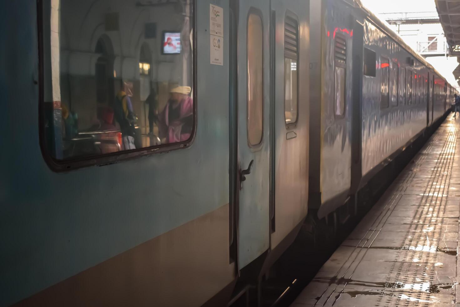 Delhi, India, July 09 2024 - Indian railway express train at departure from Anand Vihar railway station during morning time, Colourful Express train at Delhi railway station photo