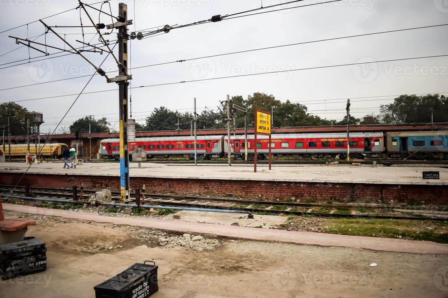View of train Railway Tracks from the middle during daytime at Kathgodam railway station in India, Train railway track view, Indian Railway junction, Heavy industry photo