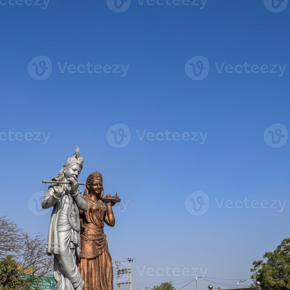 Big statue of Lord Radha Krishna near Delhi International airport, Delhi, India, Lord Krishna and Radha big statue touching sky at main highway Mahipalpur, Delhi photo
