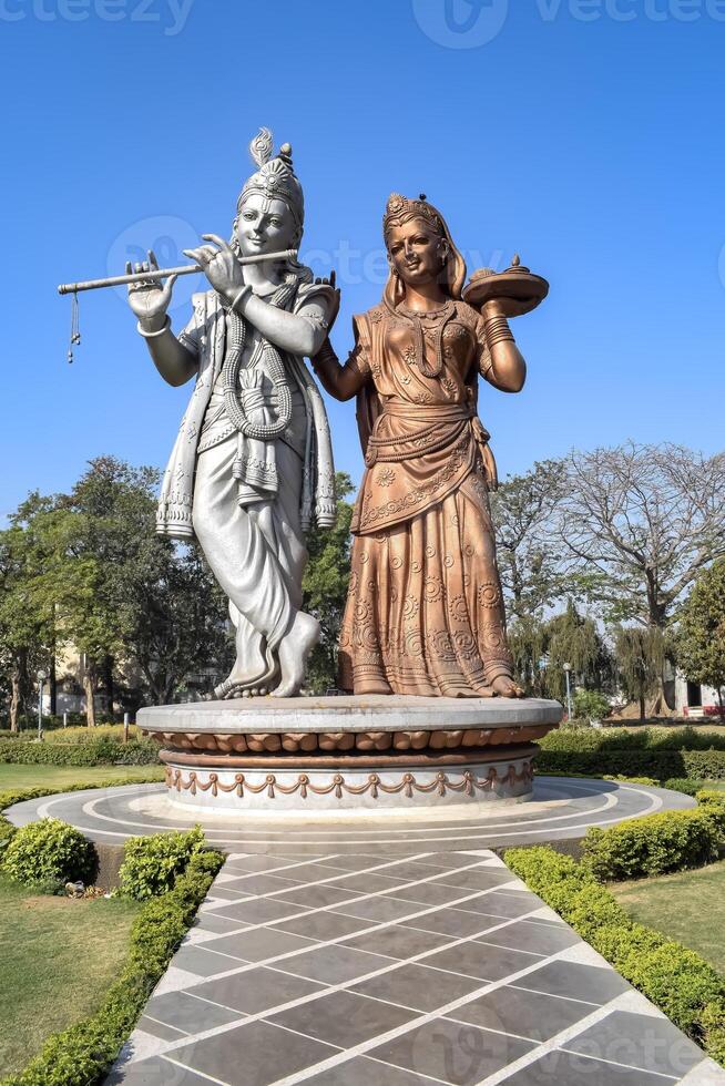 Big statue of Lord Radha Krishna near Delhi International airport, Delhi, India, Lord Krishna and Radha big statue touching sky at main highway Mahipalpur, Delhi photo