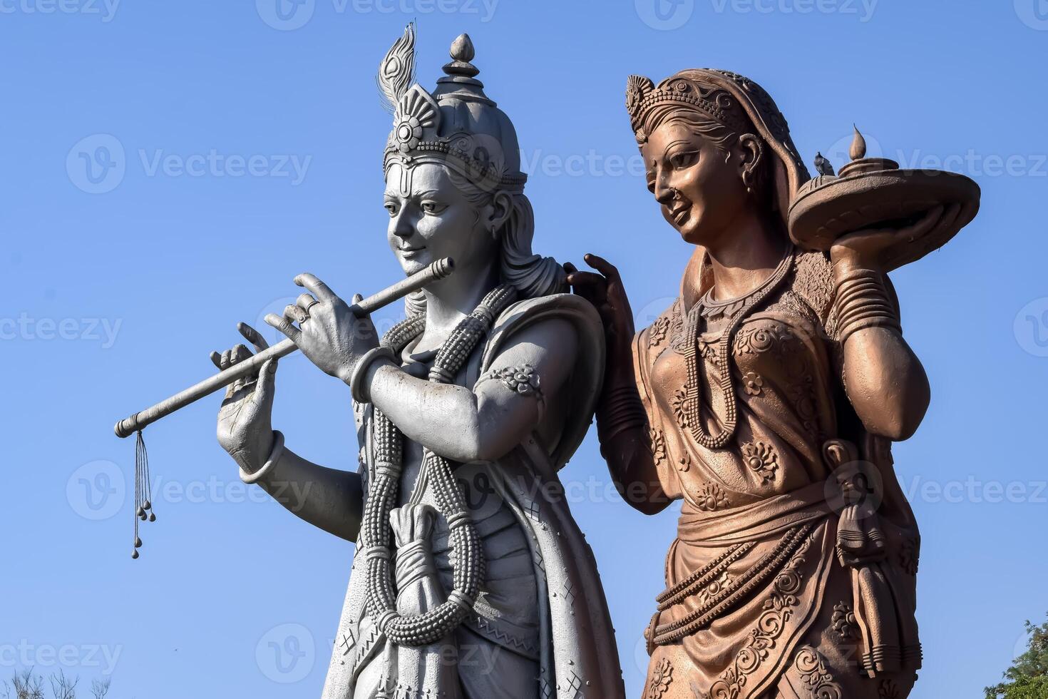 Big statue of Lord Radha Krishna near Delhi International airport, Delhi, India, Lord Krishna and Radha big statue touching sky at main highway Mahipalpur, Delhi photo