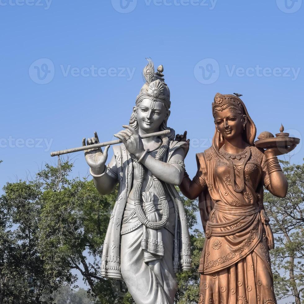 Big statue of Lord Radha Krishna near Delhi International airport, Delhi, India, Lord Krishna and Radha big statue touching sky at main highway Mahipalpur, Delhi photo
