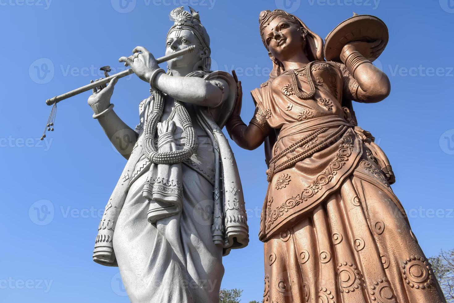 Big statue of Lord Radha Krishna near Delhi International airport, Delhi, India, Lord Krishna and Radha big statue touching sky at main highway Mahipalpur, Delhi photo