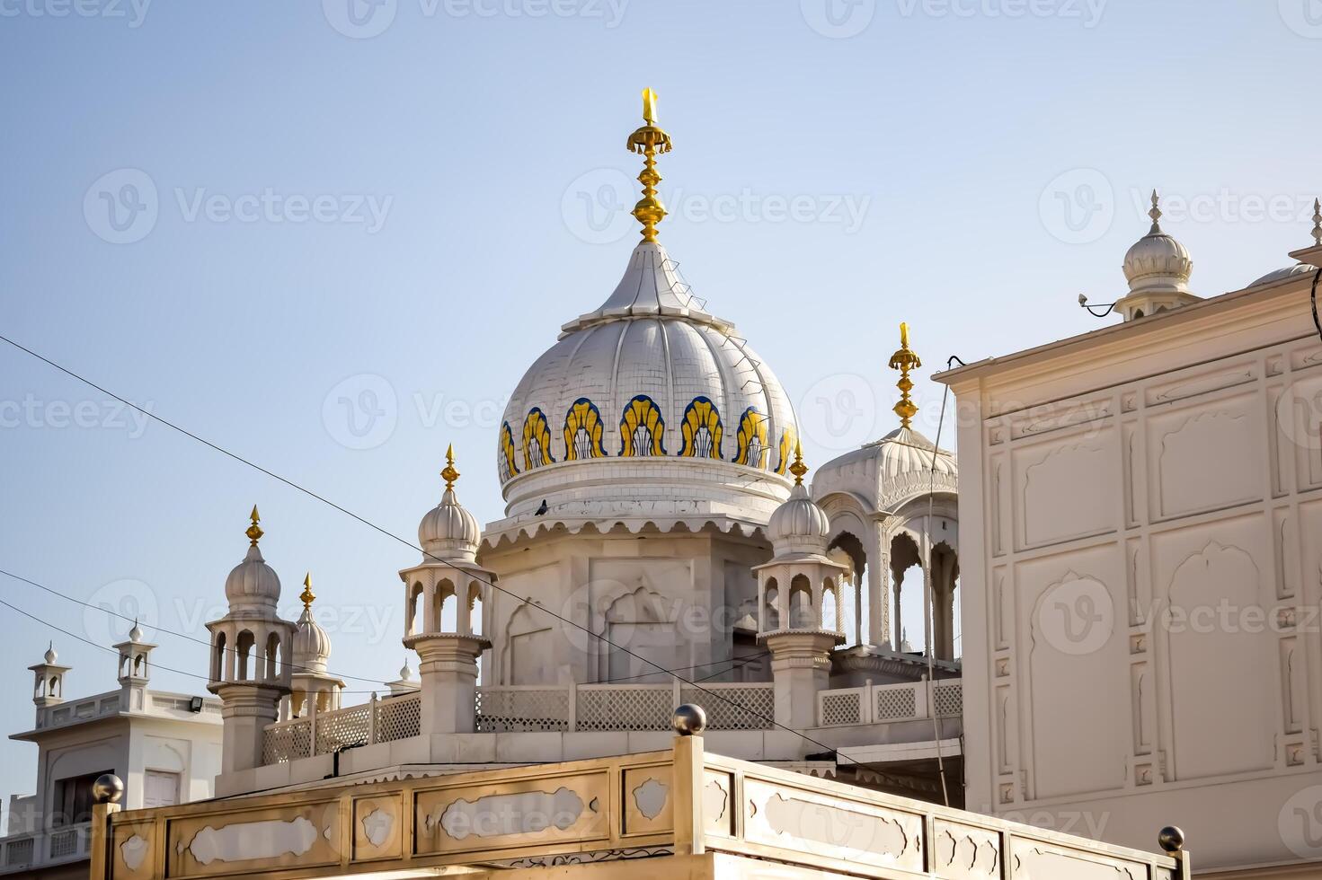 View of details of architecture inside Golden Temple - Harmandir Sahib in Amritsar, Punjab, India, Famous indian sikh landmark, Golden Temple, the main sanctuary of Sikhs in Amritsar, India photo