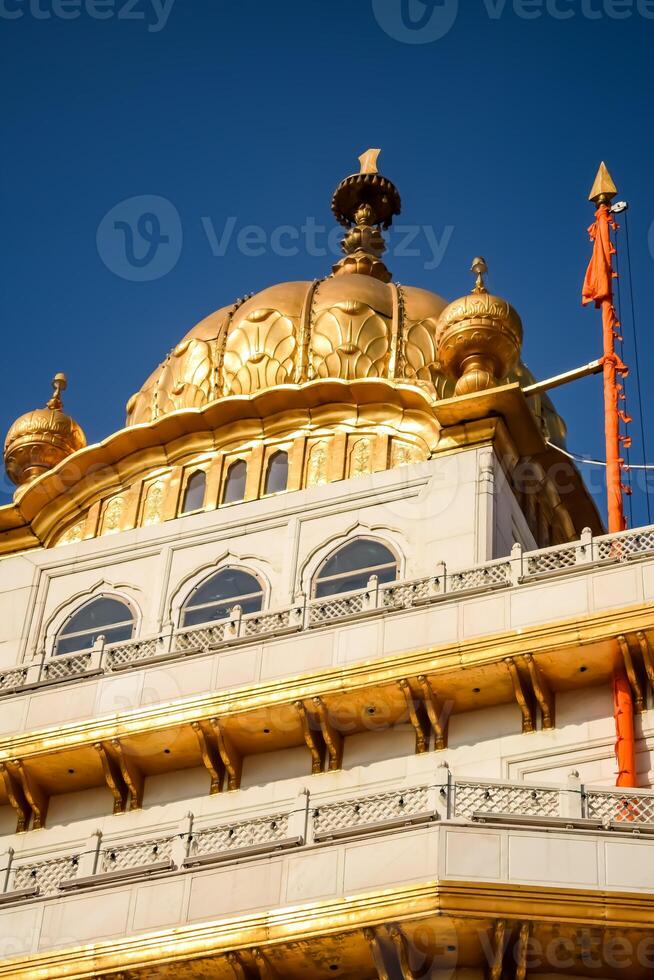 View of details of architecture inside Golden Temple - Harmandir Sahib in Amritsar, Punjab, India, Famous indian sikh landmark, Golden Temple, the main sanctuary of Sikhs in Amritsar, India photo