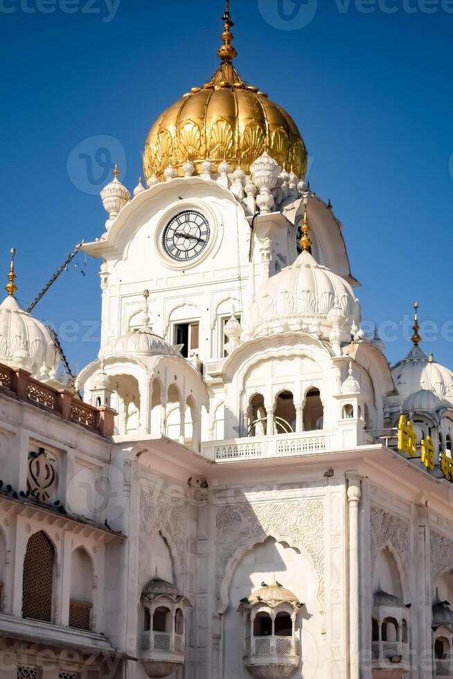 View of details of architecture inside Golden Temple - Harmandir Sahib in Amritsar, Punjab, India, Famous indian sikh landmark, Golden Temple, the main sanctuary of Sikhs in Amritsar, India photo