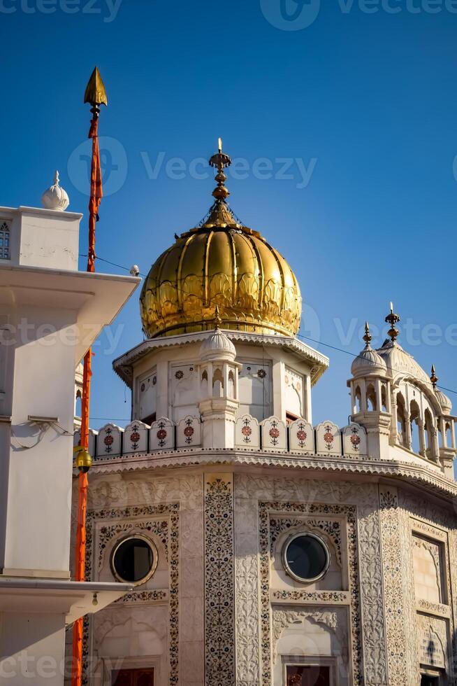 View of details of architecture inside Golden Temple - Harmandir Sahib in Amritsar, Punjab, India, Famous indian sikh landmark, Golden Temple, the main sanctuary of Sikhs in Amritsar, India photo