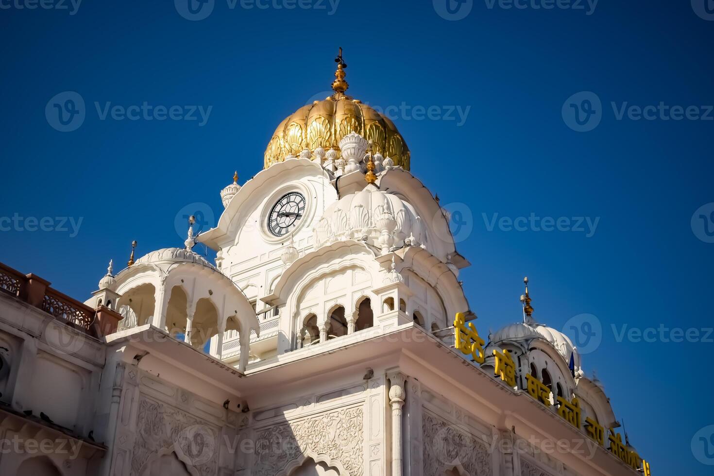 View of details of architecture inside Golden Temple - Harmandir Sahib in Amritsar, Punjab, India, Famous indian sikh landmark, Golden Temple, the main sanctuary of Sikhs in Amritsar, India photo