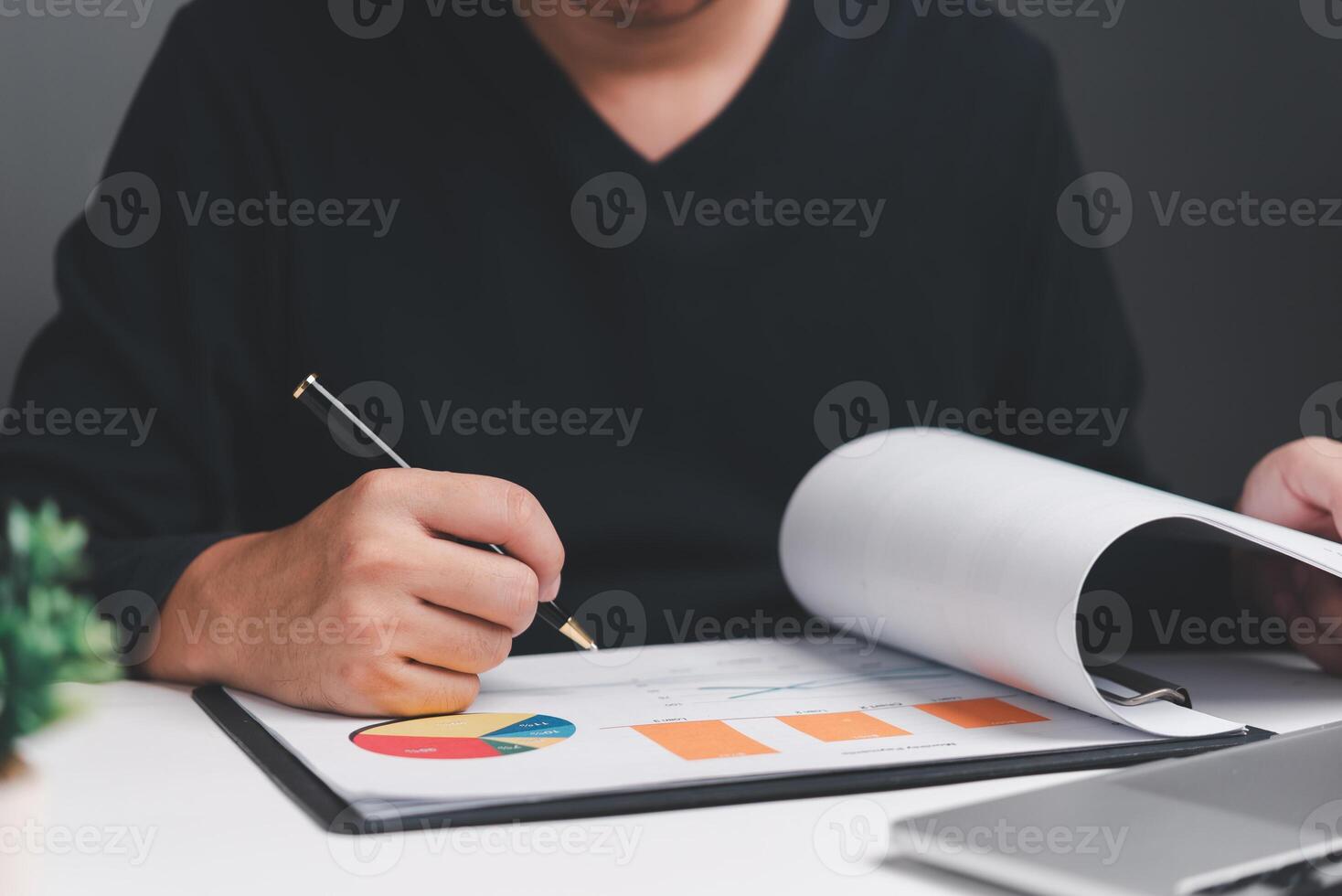 Businessman working analysis data with charts and graphs marketing. Business finances and accounting concept. photo