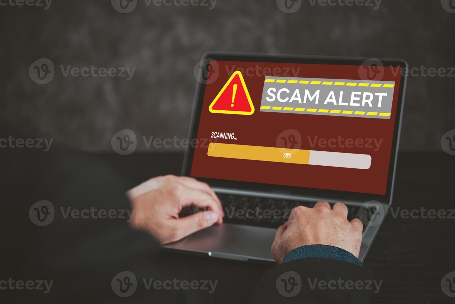 Laptop screen displaying scam alert warning. Highlights cybersecurity, online fraud, digital risk awareness. Suitable for tech security, internet safety topics. photo