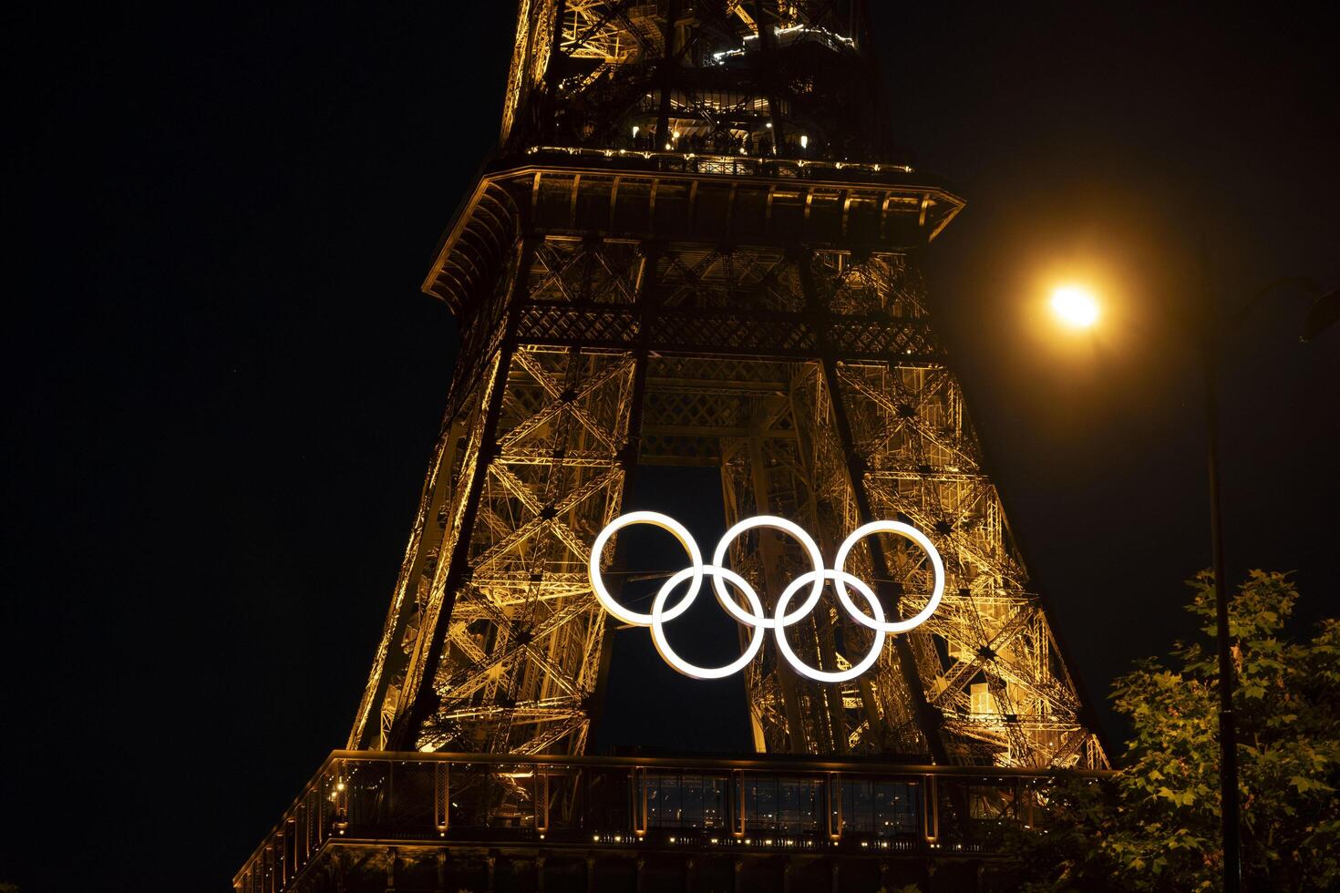 Eiffel Tower with Olympic rings to mark the games taking place in the city photo
