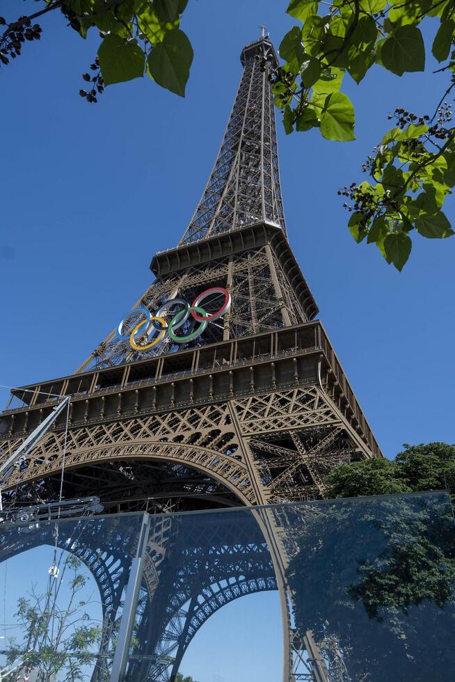 Eiffel Tower with Olympic rings to mark the games taking place in the city photo