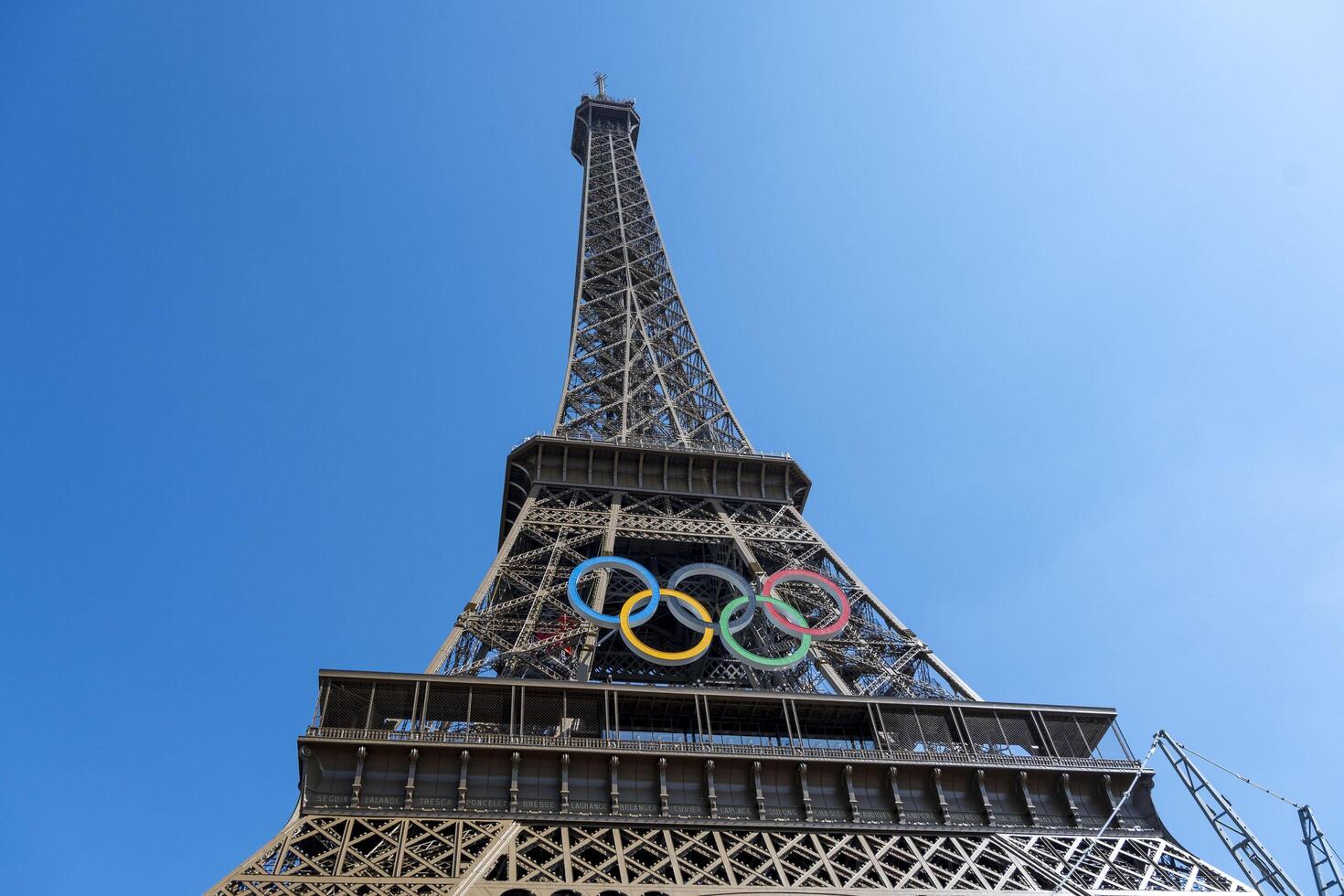 Eiffel Tower with Olympic rings to mark the games taking place in the city photo