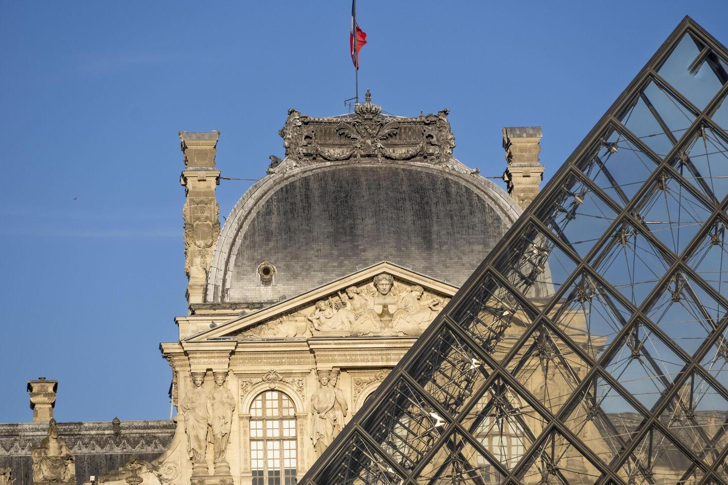 The Louvre, on the right bank of the Seine, in Paris, France's national art museum, housing important iconic works. photo